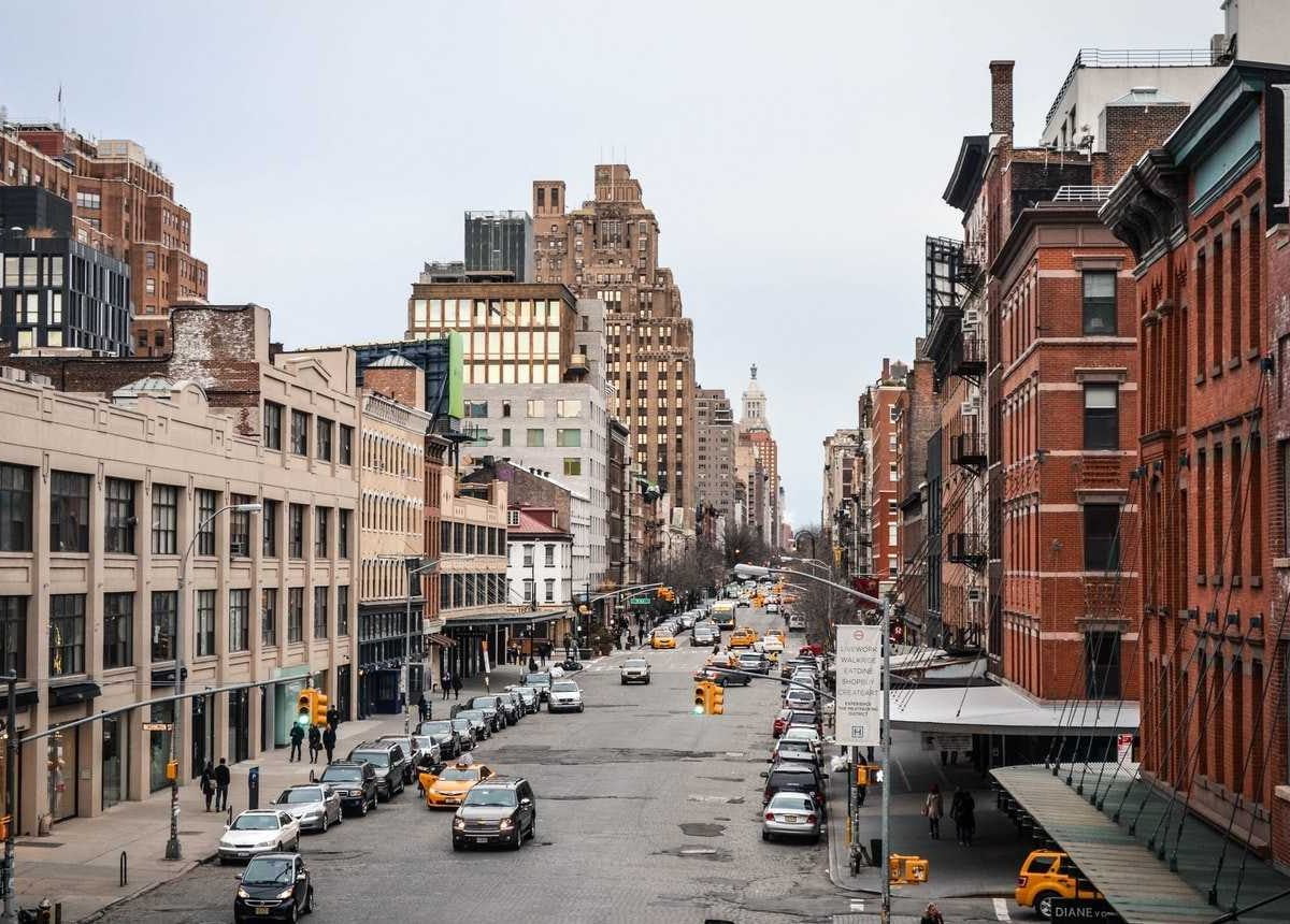 Street, cars, street signs and buildings