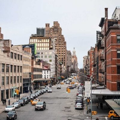 Street, cars, street signs and buildings