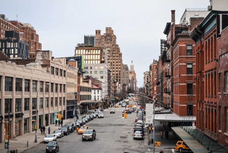 Street, cars, street signs and buildings