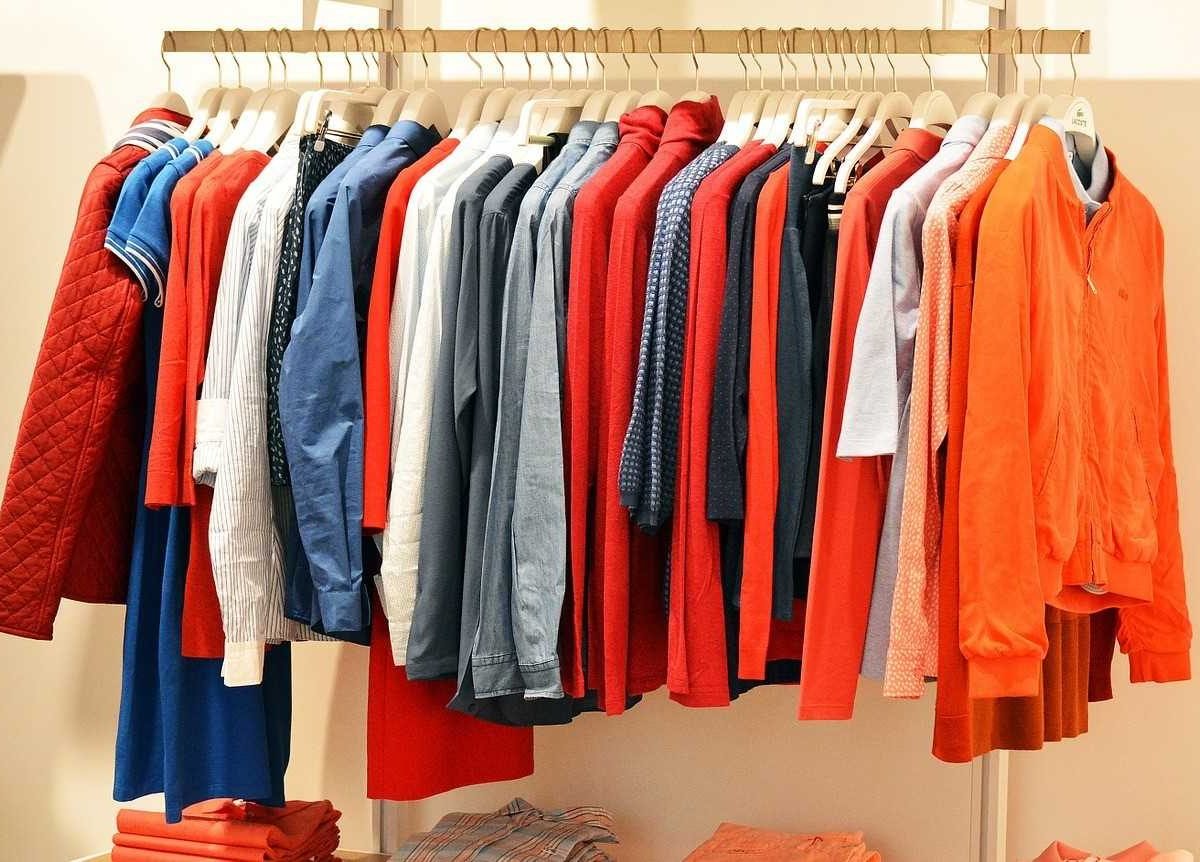 Bunch of clothes on a hangar - packing your clothes like a pro with Vector Movers NJ.