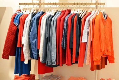 Bunch of clothes on a hangar - packing your clothes like a pro with Vector Movers NJ.