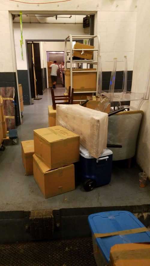 Different goods wrapped and packed in boxes ready to be moved by movers Bloomfield NJ