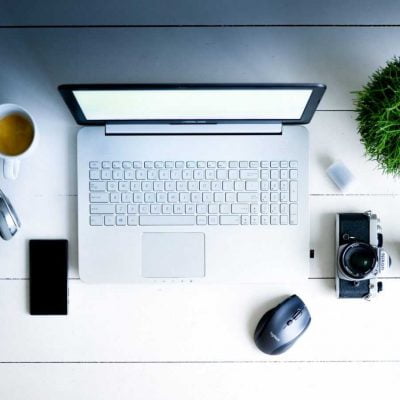 Home office space - laptop, cup of coffee, phone...