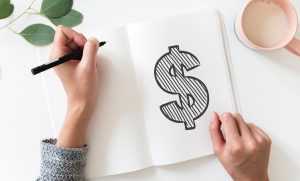 Dollar symbol written on a piece of paper