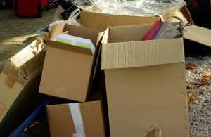 Pile of cardboard boxes - perfect to help you save money on a long distance move.