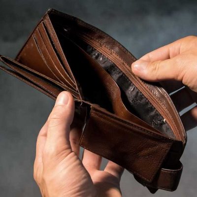 An empty wallet - a sign that you have to find ways to save money.