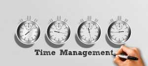 Four stopwatches with Time Management written below.